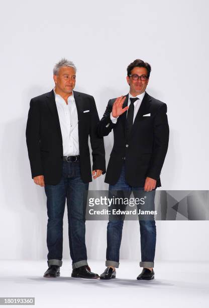 The designers Ken Kaufman and Isaac Franco walk the runway at the Kaufmanfranco show during Spring 2014 Mercedes-Benz Fashion Week at The Theatre at...