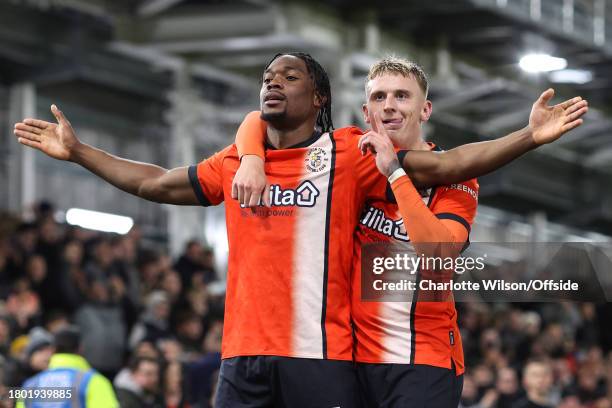 Teden Mengi of Luton Town celebrates scoring their 1st goal by antagonising the Palace fans with Alfie Doughty during the Premier League match...