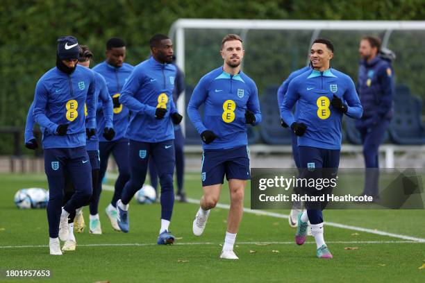 Jordan Henderson and Trent Alexander-Arnold of England train during an England Training Session at Tottenham Hotspur Training Centre on November 19,...