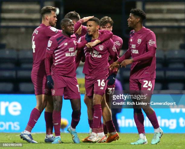 Cardiff City's Karlan Grant is mobbed by team-mates as he celebrates scoring his side's equalising goal to make the score 1-1 during the Sky Bet...