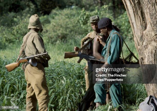 Heavily armed ZIPRA guerillas coming out of the bush into the assembly point at Camp Papa on 2nd January 1980.