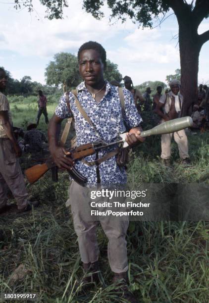 An armed ZIPRA guerilla at an assembly point at Camp Papa in the bush on 27th February 1980.