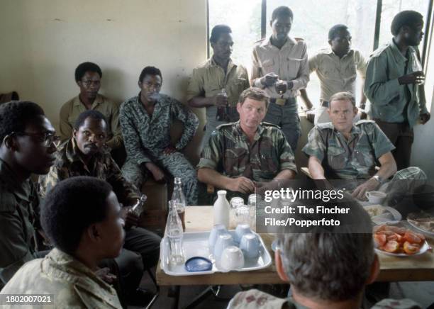 Rhodesia security forces meeting with ZIPRA at the assembly point at Camp Papa in the bush on 25th February 1980. L