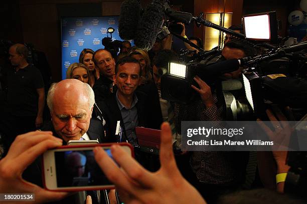 Former Australian Prime Minister John Howard finishes a interview with the press during the Liberal Party Election function on September 7, 2013 in...