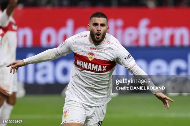 Stuttgart's German forward Deniz Undav celebrates scoring the 1-2 goal during the German first division Bundesliga football match between Eintracht...