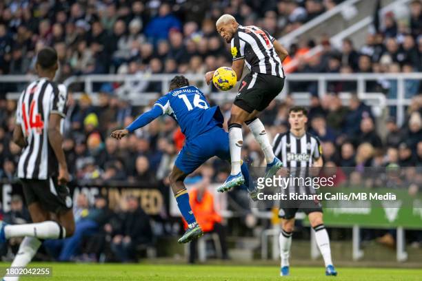 Joelinton of Newcastle United and Lesley Ugochukwu of Chelsea in action during the Premier League match between Newcastle United and Chelsea FC at...