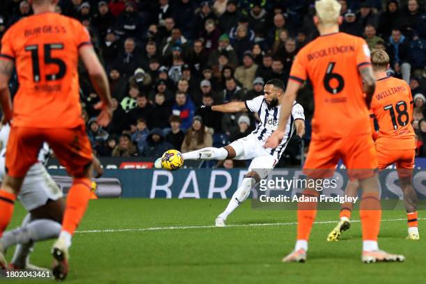 Matt Phillips of West Bromwich Albion shoots from distance but his shot is blocked by Brandon Williams of Ipswich Town during the Sky Bet...