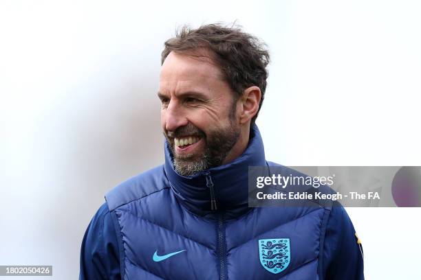 Gareth Southgate, Head Coach of England, smiles during an England Training Session at Tottenham Hotspur Training Centre on November 19, 2023 in...