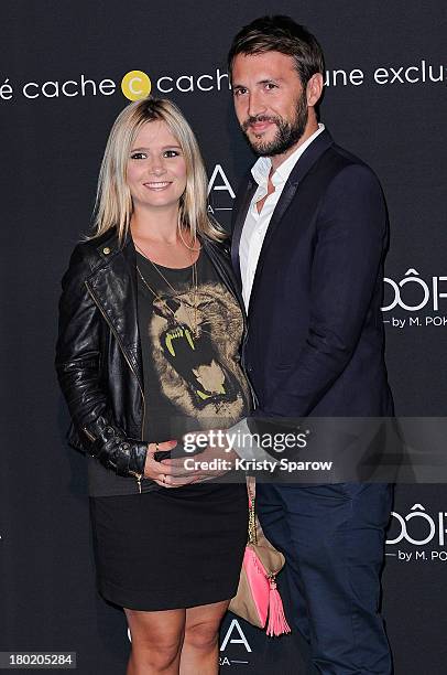 Marie Inbona and Alexandre Halimi attend the photocall for 'OORA' Womenswear Collection Designed By French Singer Matt Pokora at Pavillon Gabriel on...