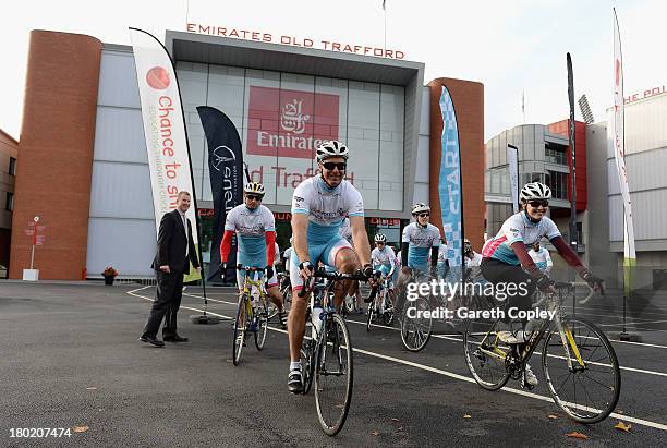 Laureus Academy Ambassador Michael Vaughan and Victoria Pendleton prepare to set off on the second leg of the PruProtect Chance to Ride. Vaughan is...