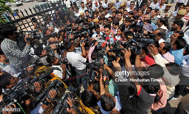Defense lawyer AP Singh surrounded by journalists as he comes out of Saket court after an Indian court convicted four men in December 16 gang rape...