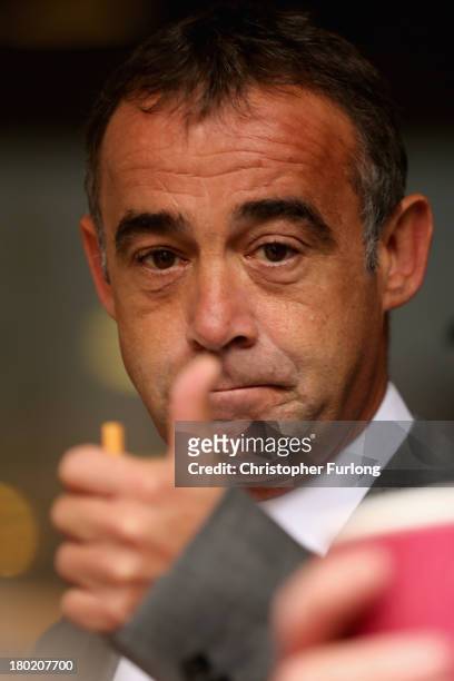 Michael Le Vell, who plays Kevin Webster in the TV soap Coronation Street, gestures to a wellwisher as he takes a break from proceedings at...