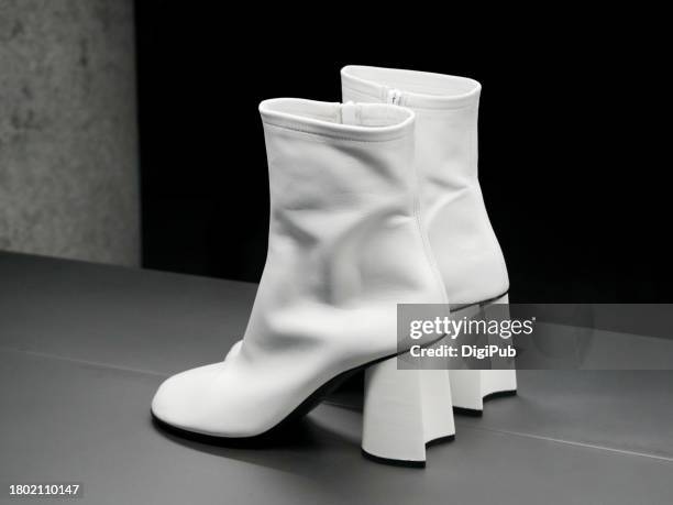 women's white ankle boots - botas-blancas fotografías e imágenes de stock