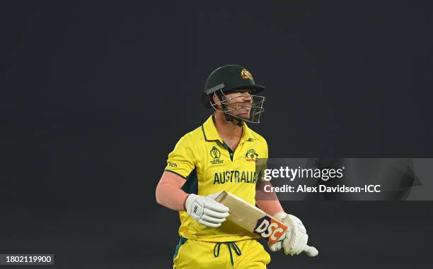 David Warner of Australia makes his way off after being dismissed during the ICC Men's Cricket World Cup India 2023 Final between India and Australia...