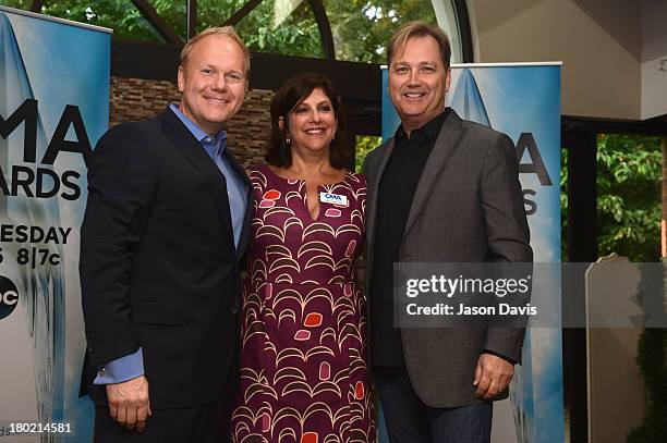 Troy Tomlinson, Sheri Warnke and Steve Wariner at The 47th Annual CMA Awards Nominee Announcements at CMA Atrium on September 10, 2013 in Nashville...