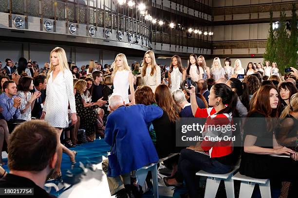Models walk the runway at the Tory Burch fashion show during Mercedes-Benz Fashion Week Spring at David H. Koch Theater at Lincoln Center on...