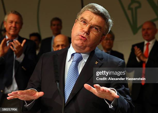 Thomas Bach reacts as he is announced as the ninth IOC President during the 125th IOC Session - IOC Presidential Election at the Hilton Hotel on on...