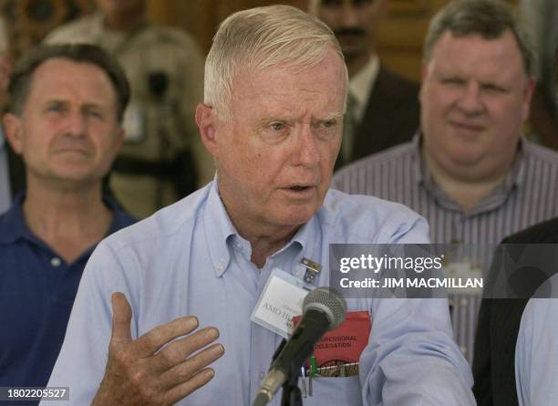 Congressman Amo Houghton, speaks during a U.S. Congressional Delegation visit in Baghdad, Iraq, 18 September 2004. At rear from left are: congressmen...