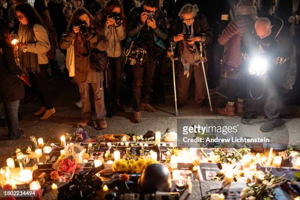 Journalists attend a memorial vigil for slain colleagues on November 6, 2023 in Foley Square, New York City, New York. Thirty five Palestinian...