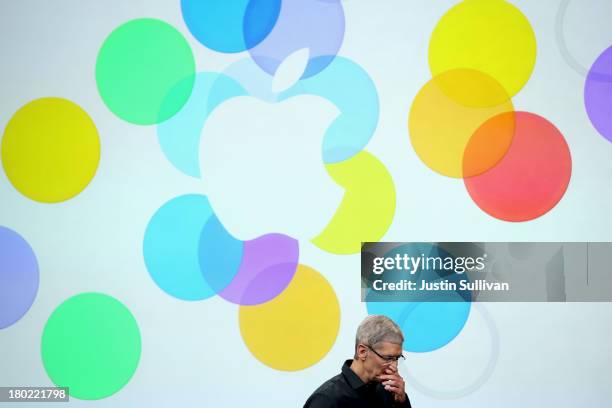 Apple CEO Tim Cook speaks on stage during an Apple product announcement at the Apple campus on September 10, 2013 in Cupertino, California. The...