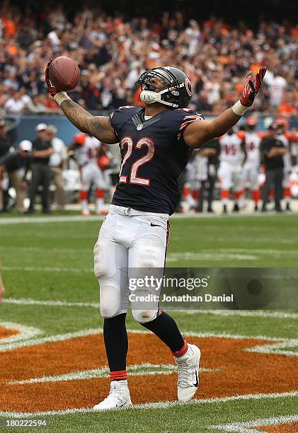 Matt Forte of the Chicago Bears celebrates a touchdown run against the Cincinnati Bengals at Soldier Field on September 8, 2013 in Chicago, Illinois....