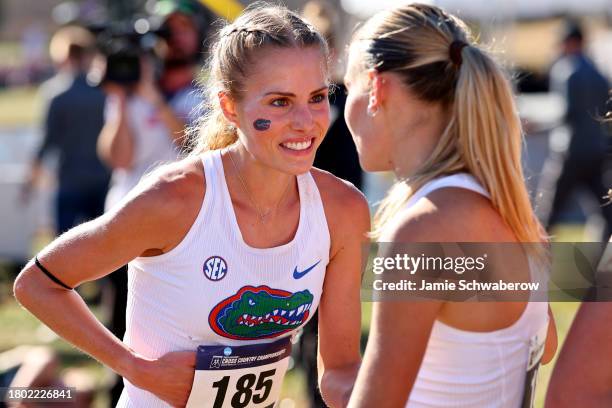 Kyle Valby Florida Parker Valby of the Florida Gators celebrates after racing to a first ...