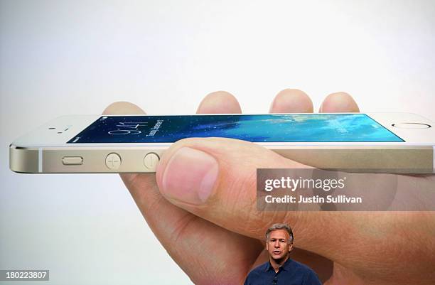 Apple Senior Vice President of Worldwide Marketing at Phil Schiller speaks about the new iPhone 5S during an Apple product announcement at the Apple...