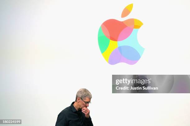 Apple CEO Tim Cook speaks on stage during an Apple product announcement at the Apple campus on September 10, 2013 in Cupertino, California. The...