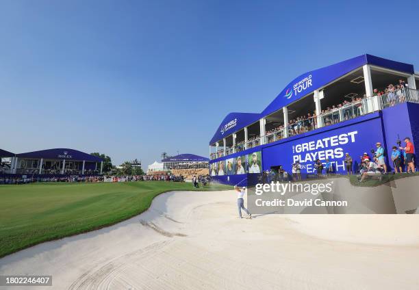 Rory McIlroy of Northern Ireland plays his third shot on the 18th hole during the final round on Day Four of the of the DP World Tour Championship on...