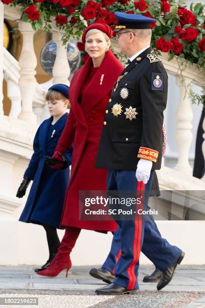 Princess Gabriella of Monaco, Princess Charlene of Monaco and Prince Albert II of Monaco attend the Monaco National Day 2023 on November 19, 2023 in...