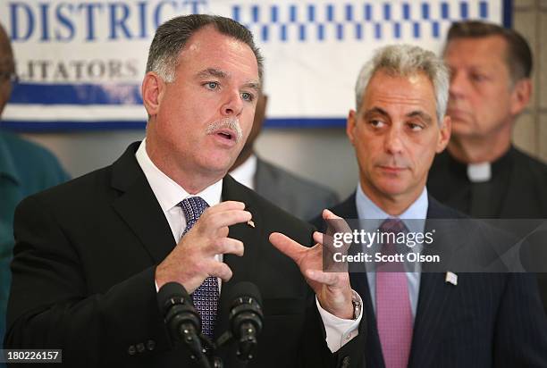 Chicago Mayor Rahm Emanuel listens as Police Superintendent Garry McCarthy speaks at a press conference on September 10, 2013 in Chicago, Illinois....