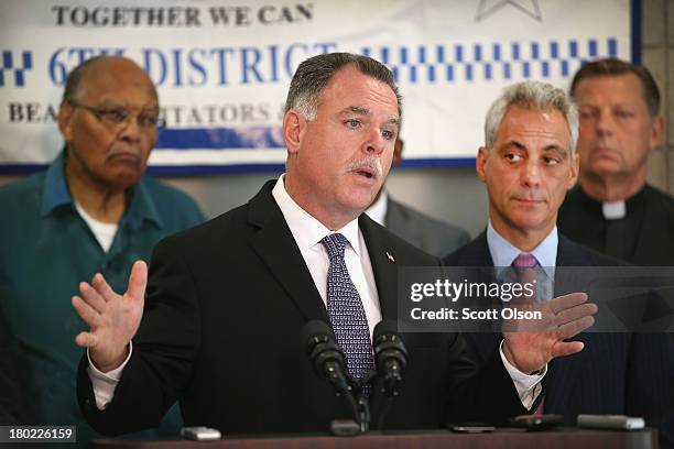 Chicago Mayor Rahm Emanuel listens as Police Superintendent Garry McCarthy speaks at a press conference on September 10, 2013 in Chicago, Illinois....