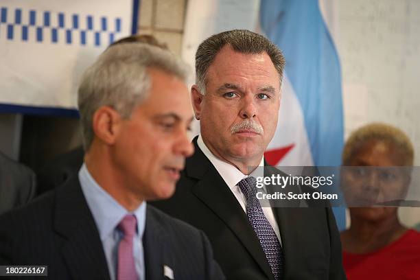 Chicago Police Superintendent Garry McCarthy listens as Chicago Mayor Rahm Emanuel speaks at a press conference on September 10, 2013 in Chicago,...