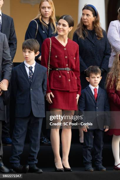 Raphael Elmaleh, Charlotte Casiraghi and Balthazar Rassam attend the Monaco National Day 2023 on November 19, 2023 in Monaco, Monaco.