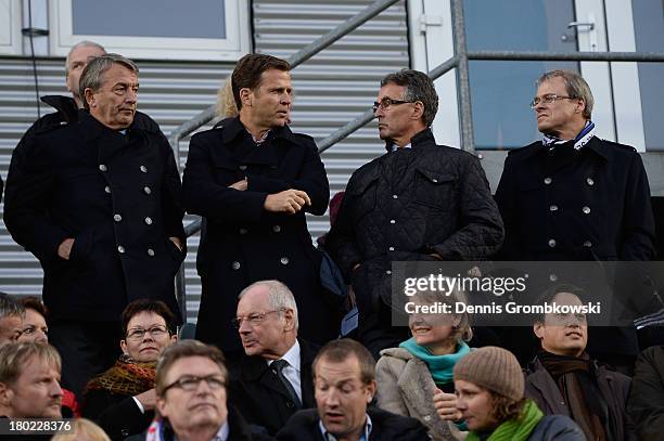 President Wolfgang Niersbach, manager Oliver Bierhoff, DFB general secretary Helmut Sandrock and DFL vice president Peter Peters attend the FIFA 2014...