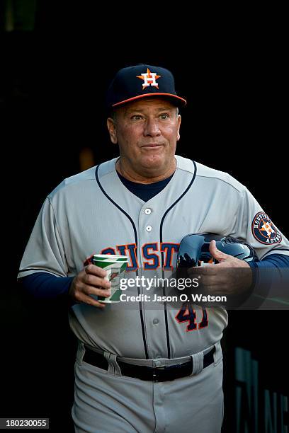 Dave Trembley of the Houston Astros enters the dugout before the game against the Oakland Athletics at O.co Coliseum on September 5, 2013 in Oakland,...