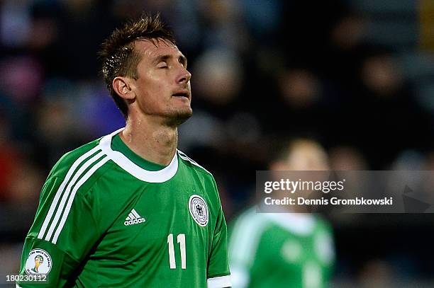 Miroslav Klose of Germany despairs after missing a chance to head a goal during the FIFA 2014 World Cup Qualifier match between Faeroe Islands and...