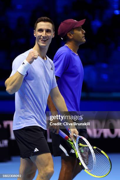 Joe Salisbury of Great Britain celebrates match point with Rajeev Ram of United States during the Men's Doubles Final against Horacio Zeballos of...