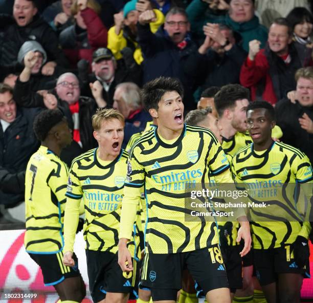 Arsenal's Takehiro Tomiyasu celebrates his sides first goal during the Premier League match between Brentford FC and Arsenal FC at Gtech Community...