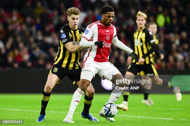 Ramon Hendriks of Vitesse, Chuba Akpom of Ajax during the Dutch Eredivisie match between Ajax Amsterdam and Vitesse at the Johan Cruijff ArenA on...