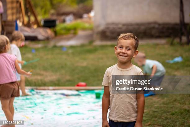 child drawing outdoors - creative people outside stock pictures, royalty-free photos & images