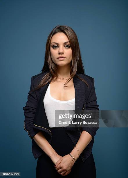 Actress Mila Kunis of 'Third Person' poses at the Guess Portrait Studio during 2013 Toronto International Film Festival on September 10, 2013 in...