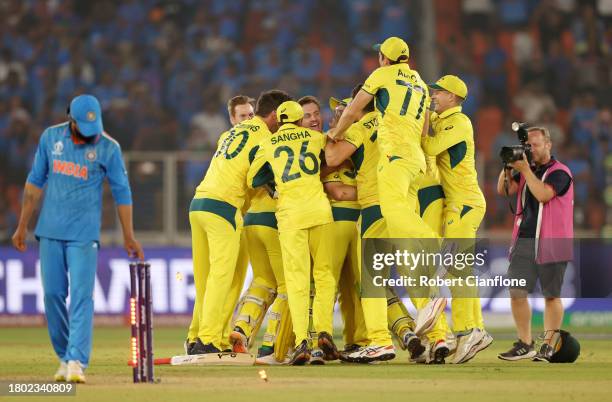 Players of Australia celebrate after winning the ICC Men's Cricket World Cup following the ICC Men's Cricket World Cup India 2023 Final between India...