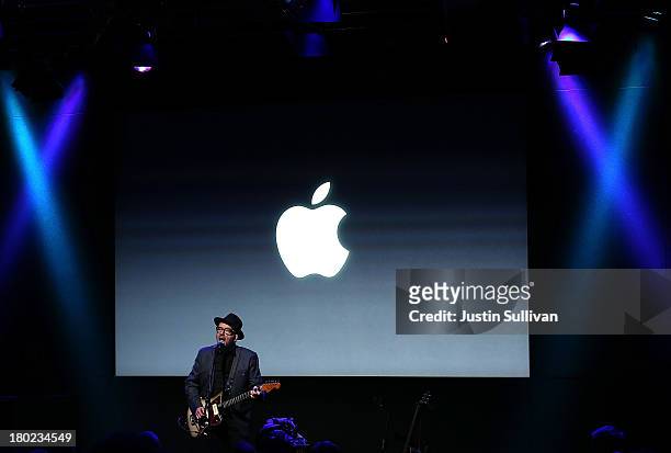 Musician Elvis Costello performs during an Apple product announcement at the Apple campus on September 10, 2013 in Cupertino, California. The company...