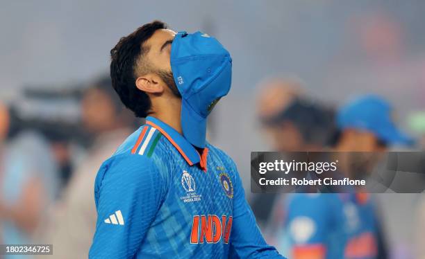 Virat Kohli of India cuts a dejected figure following the ICC Men's Cricket World Cup India 2023 Final between India and Australia at Narendra Modi...