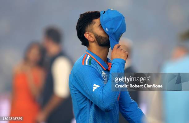 Virat Kohli of India cuts a dejected figure following the ICC Men's Cricket World Cup India 2023 Final between India and Australia at Narendra Modi...