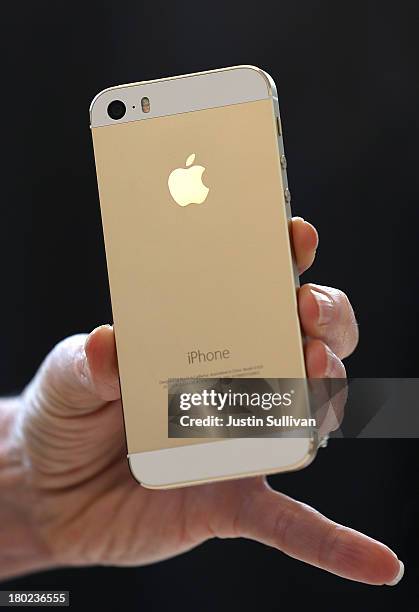 The new iPhone 5S is displayed during an Apple product announcement at the Apple campus on September 10, 2013 in Cupertino, California. The company...