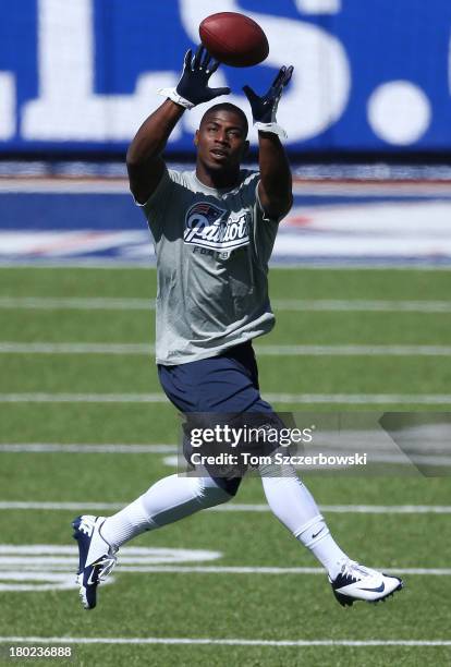 Alfonzo Dennard of the New England Patriots warms up before NFL game action against the Buffalo Bills at Ralph Wilson Stadium on September 8, 2013 in...