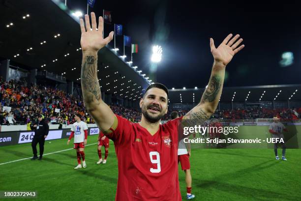 Aleksandar Mitrovic of Serbia shows appreciation to the fans at full-time following the UEFA EURO 2024 European qualifier match between Serbia and...