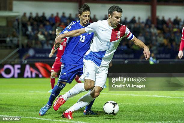 Goalkeeper Ferran Pol Perez of Andorra, Robin van Persie of Holland during the FIFA 2014 World Cup qualifier match between Andorra and the...